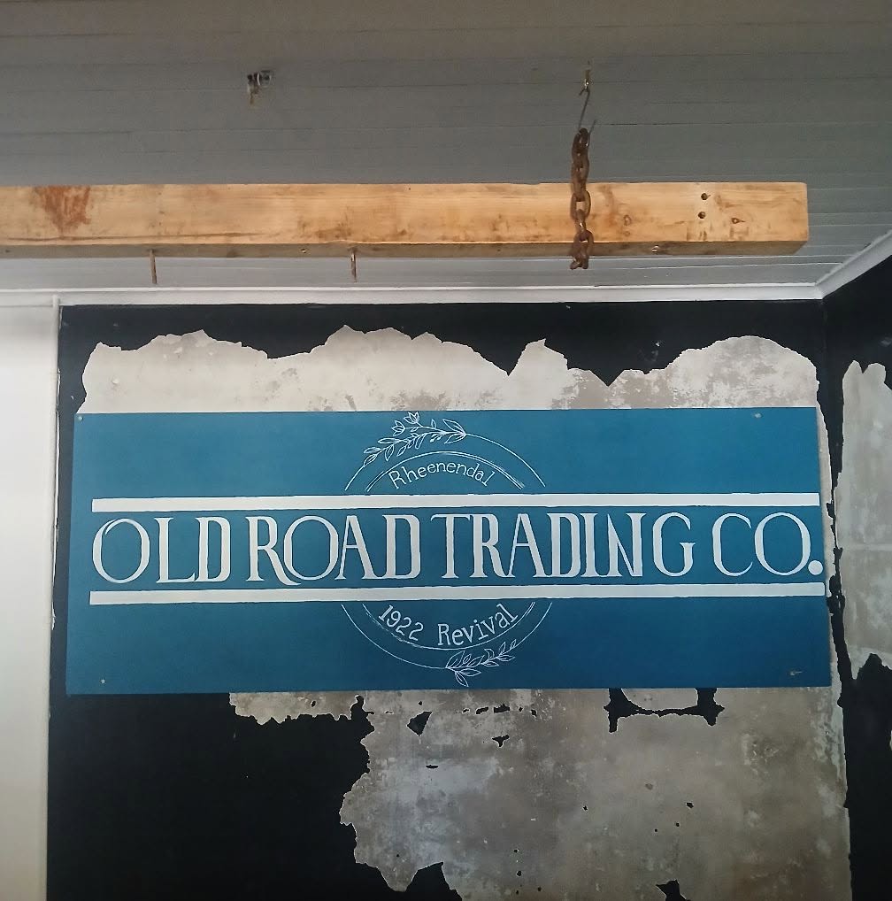 Old Road Trading Co. sign on the interior wall