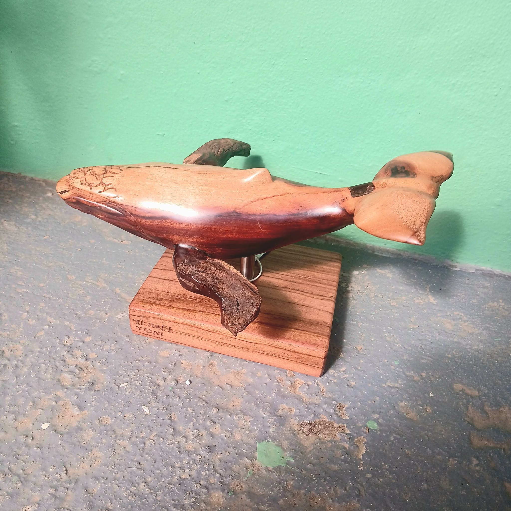 Hand-carved wooden whale sculpture